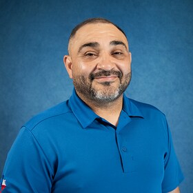Staff member Edwin Flores from ID_72eee99b6256