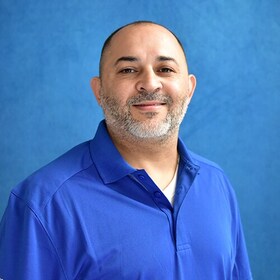 Staff member Santos Flores from ID_effd35