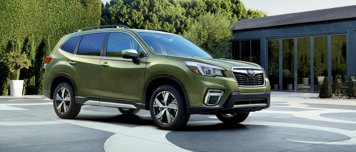 Green 2020 Subaru Forester parked in a drive way