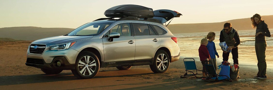 2017 Subaru Outback parked on beach