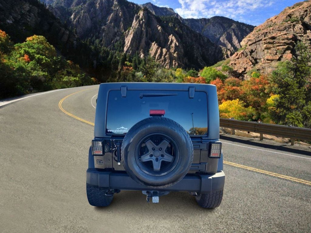 Used 2013 Jeep Wrangler Unlimited Sport SUV