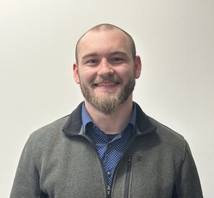 Staff member Logan Dawson from ID_e1db1796ffd9