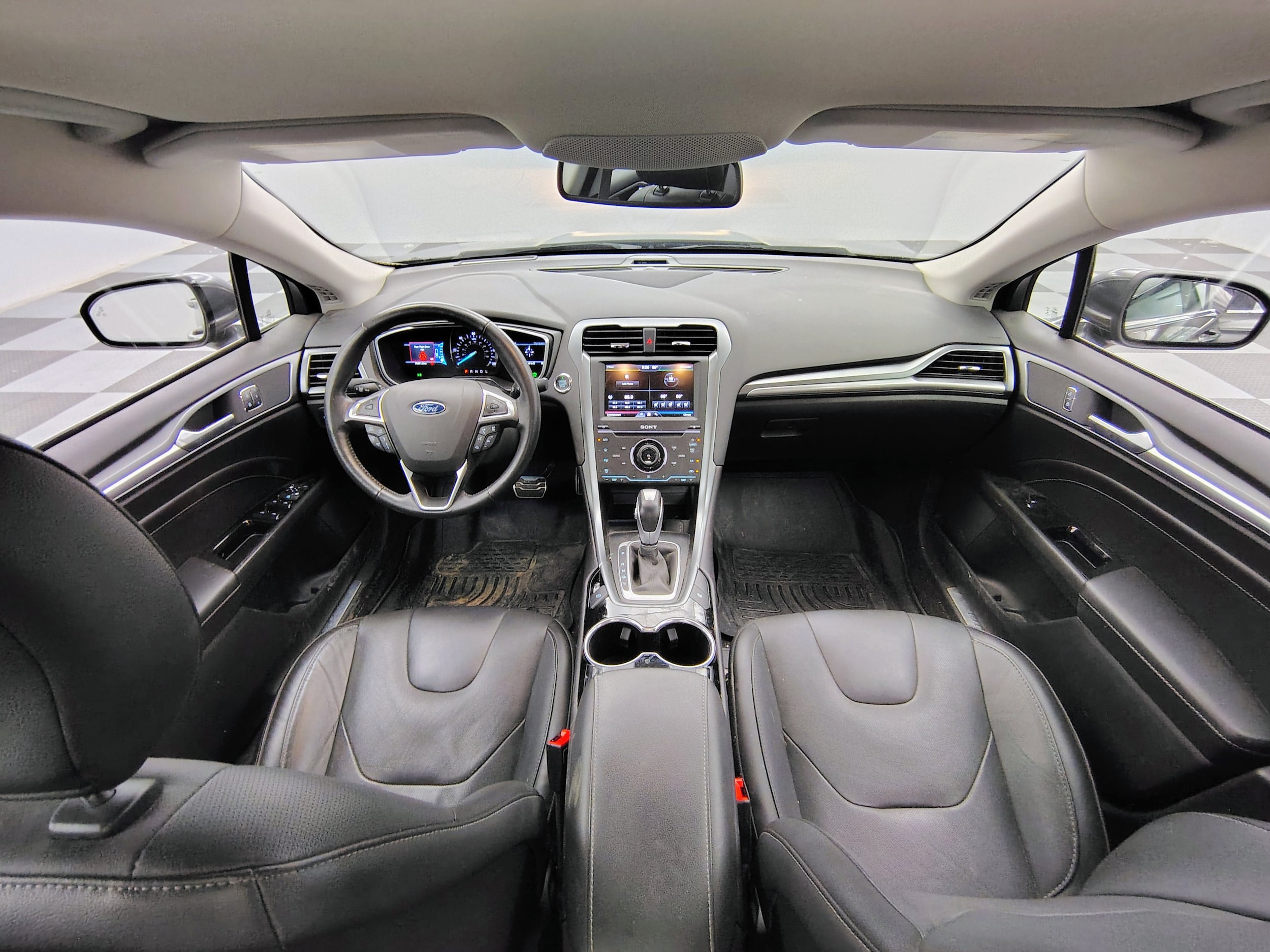 Used 2015 Ford Fusion Hybrid Titanium with VIN 3FA6P0RU3FR198843 for sale in Granger, IA