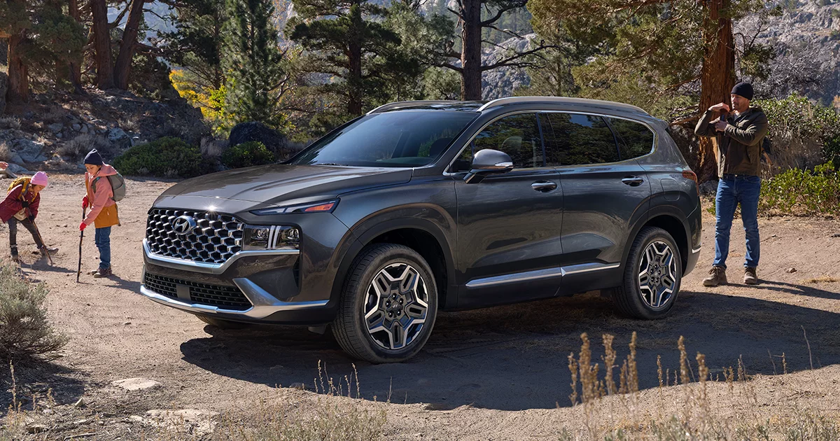 2024 Hyundai Santa Fe Hybrid parked in the woods