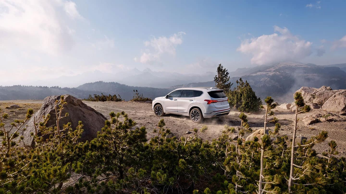 Action shot of a 2023 Hyundai Santa Fe off-roading
