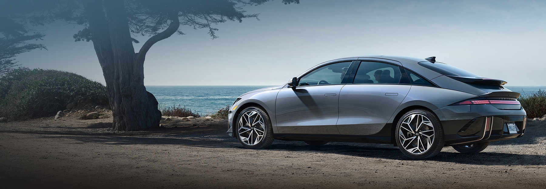 The Hyundai IONIQ 6 parked by the beach
