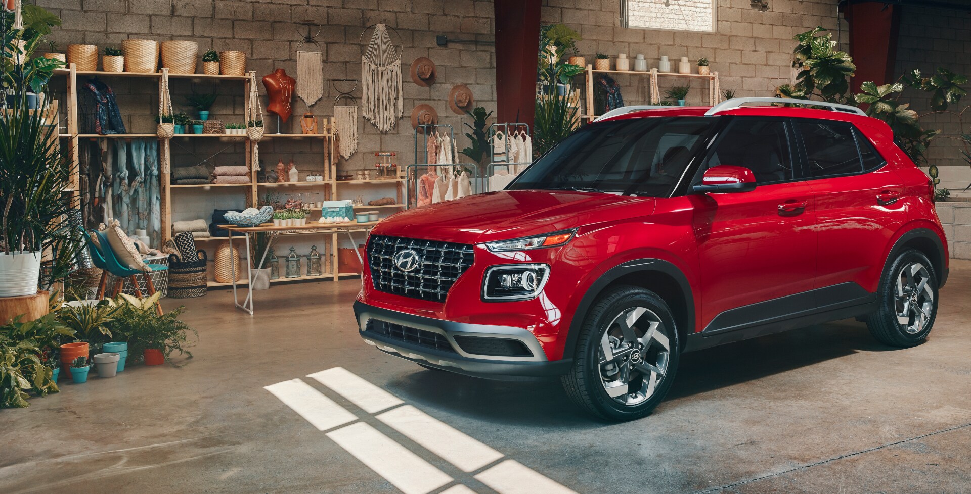 A red Hyundai Venue LTD