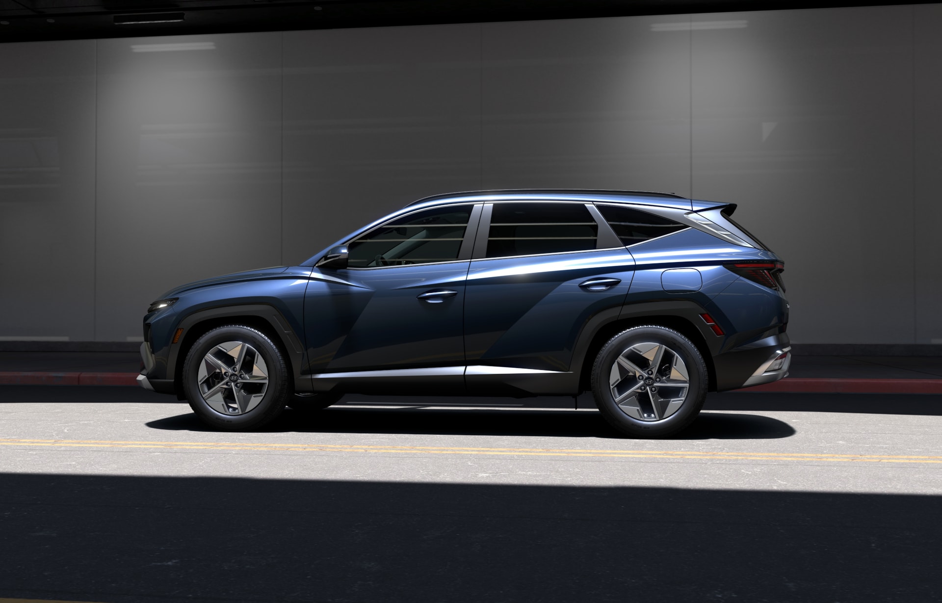 An exterior view of the 2025 Hyundai Tucson Convenience in Atlantis Blue