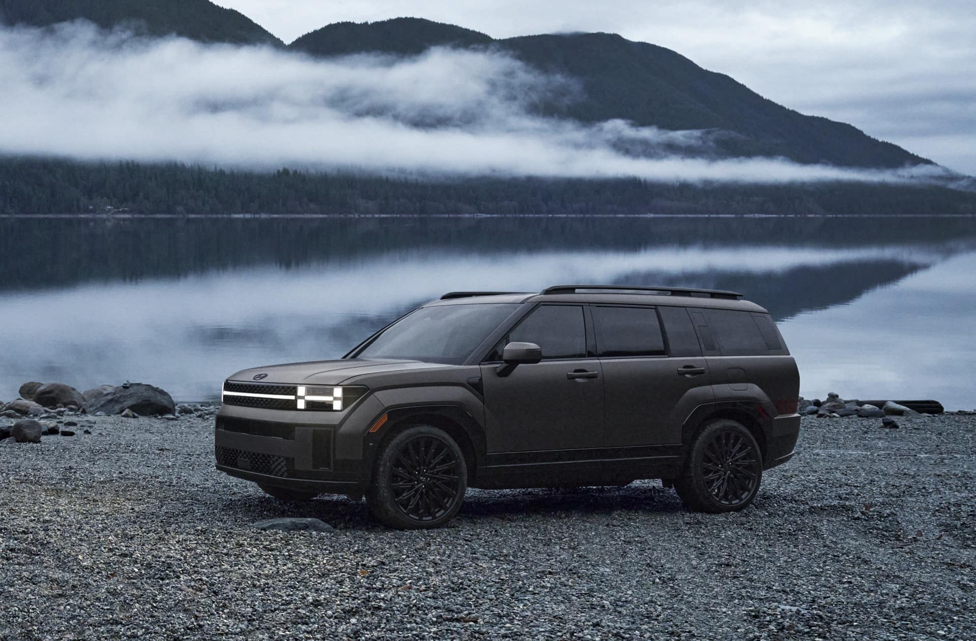 2024 Hyundai Santa Fe parked by a mountain lake