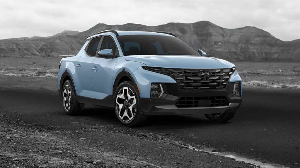 2024 Hyundai Santa Cruz parked in front of a mountain