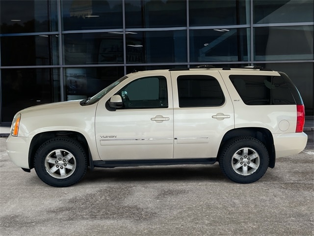 Used 2011 GMC Yukon SLT with VIN 1GKS2CE0XBR333127 for sale in Rapid City, SD