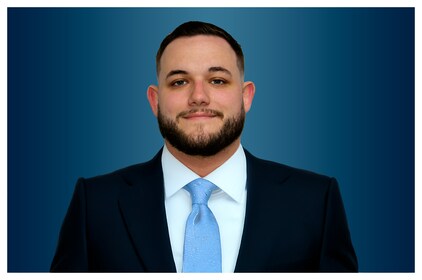 Staff member Tyler Odom from 1c63e781305a