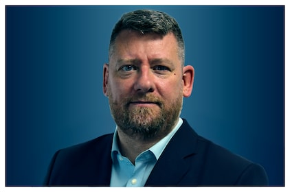 Staff member Eric Holland from f6ef81024097