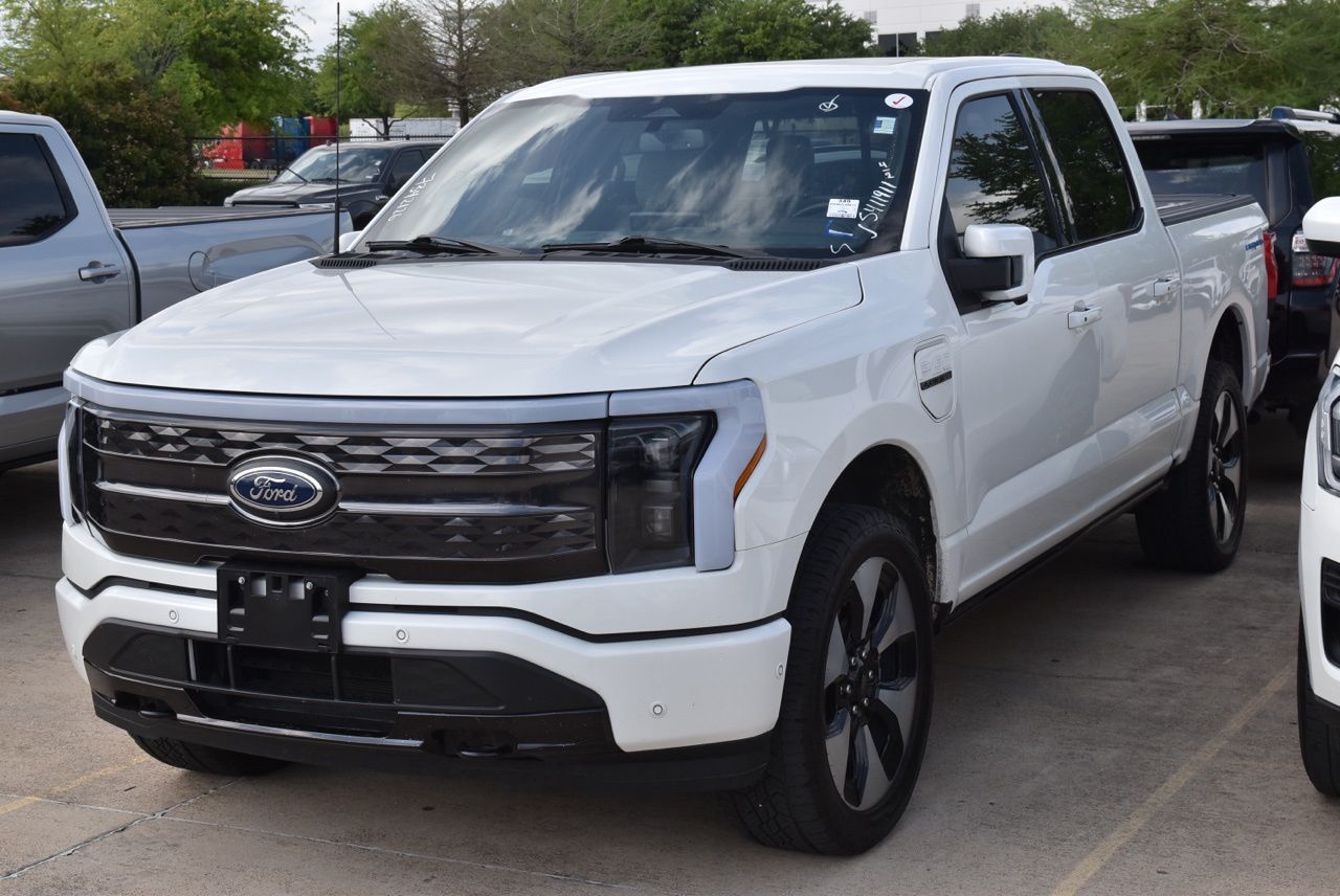 Certified 2023 Ford F-150 Lightning Platinum with VIN 1FT6W1EV4PWG49617 for sale in Grapevine, TX