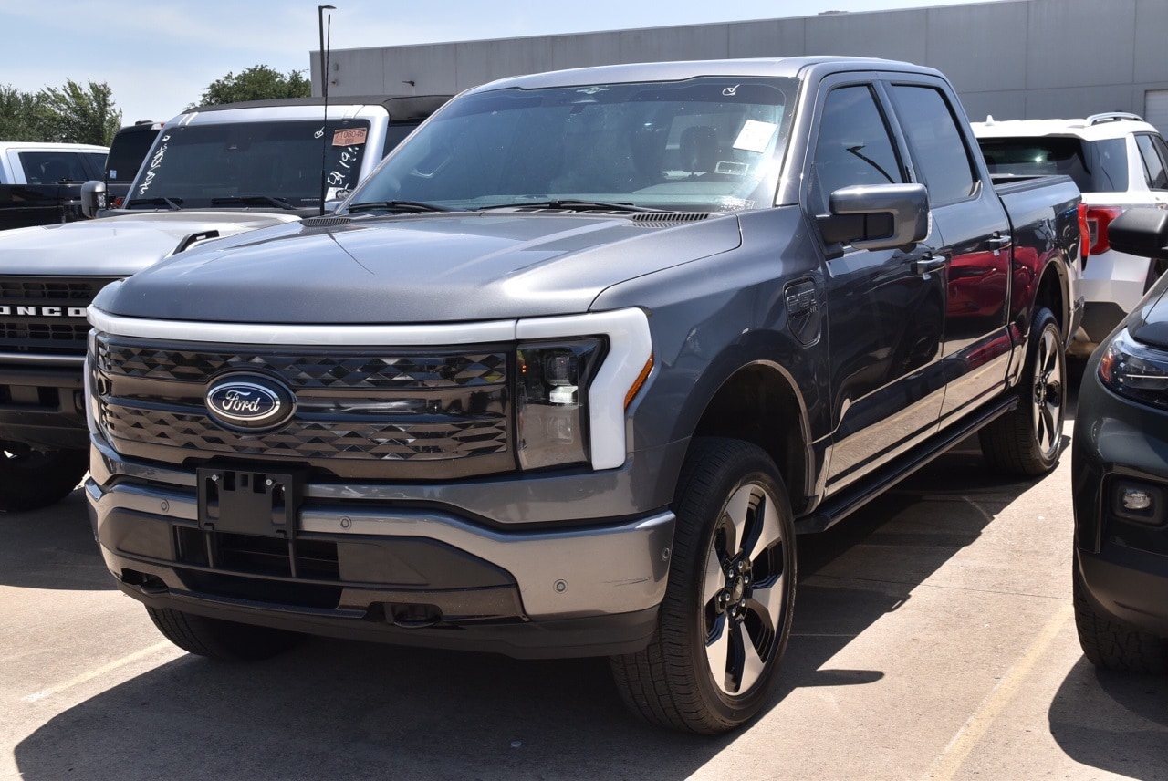 Used 2023 Ford F-150 Lightning Platinum with VIN 1FT6W1EV4PWG19128 for sale in Grapevine, TX