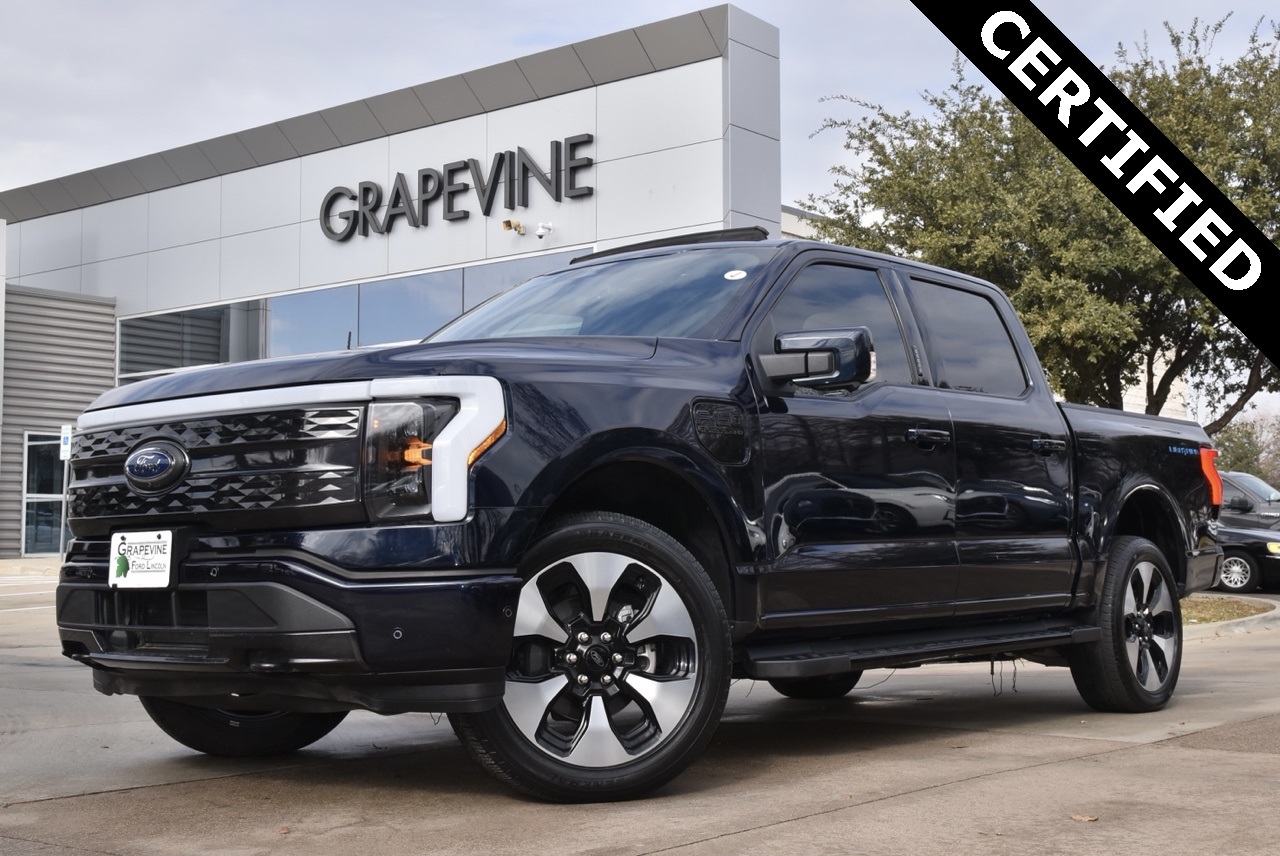 Certified 2022 Ford F-150 Lightning Platinum with VIN 1FT6W1EV7NWG11019 for sale in Grapevine, TX