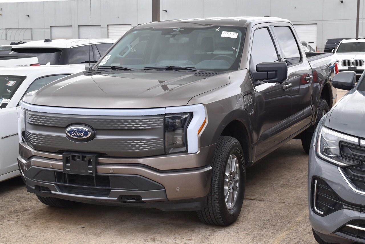 Used 2023 Ford F-150 Lightning XLT with VIN 1FT6W1EV0PWG29560 for sale in Grapevine, TX