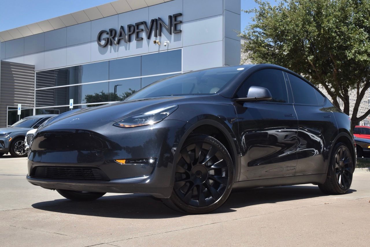 Used 2025 Tesla Model Y Long Range with VIN 7SAYGAEE7SF242512 for sale in Grapevine, TX