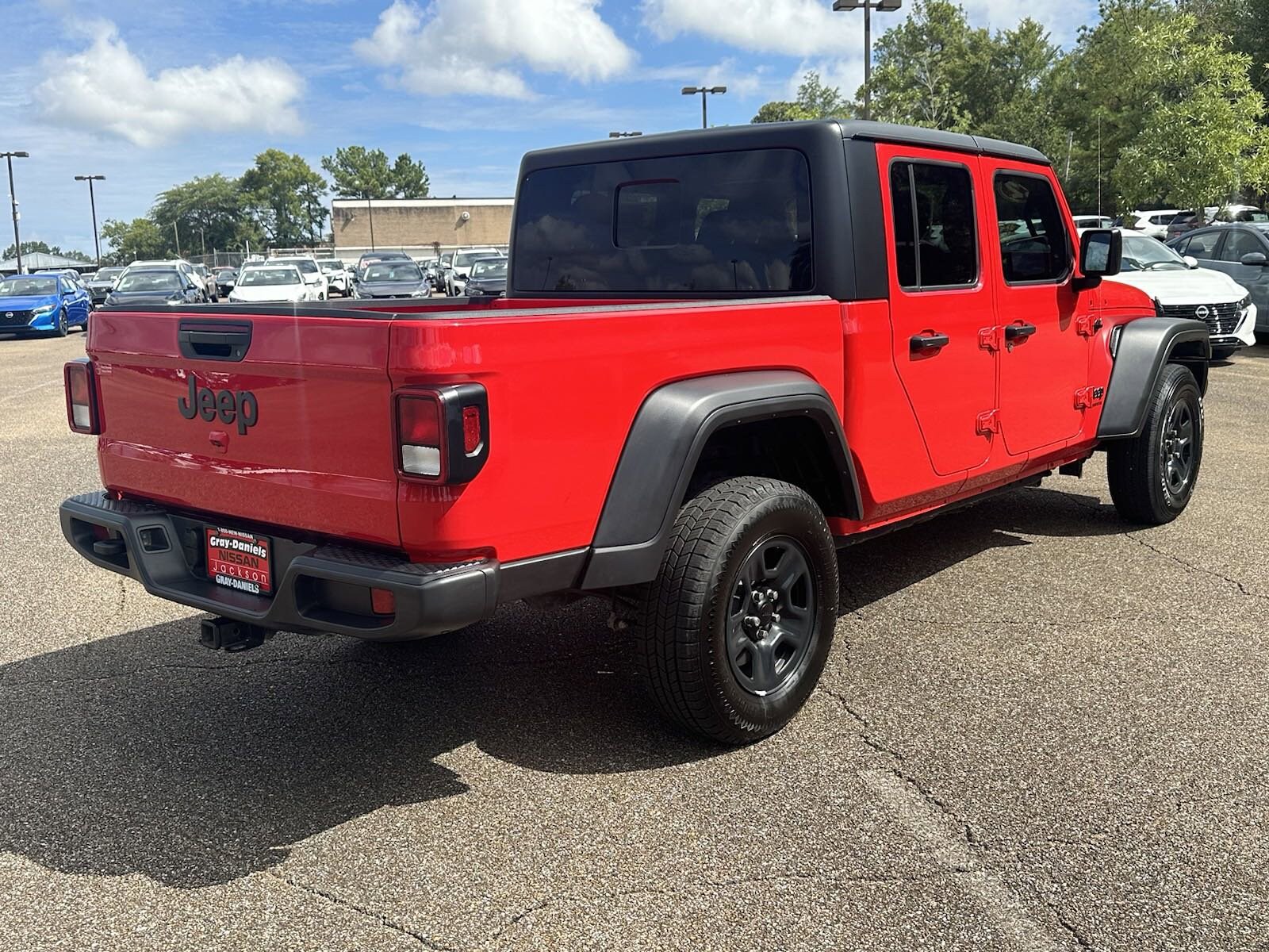 Used 2022 Jeep Gladiator Sport with VIN 1C6HJTAG2NL133854 for sale in Jackson, MS