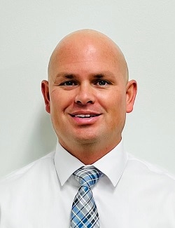 Staff member Carson Fuller from ID_2cc49f6e5c7b
