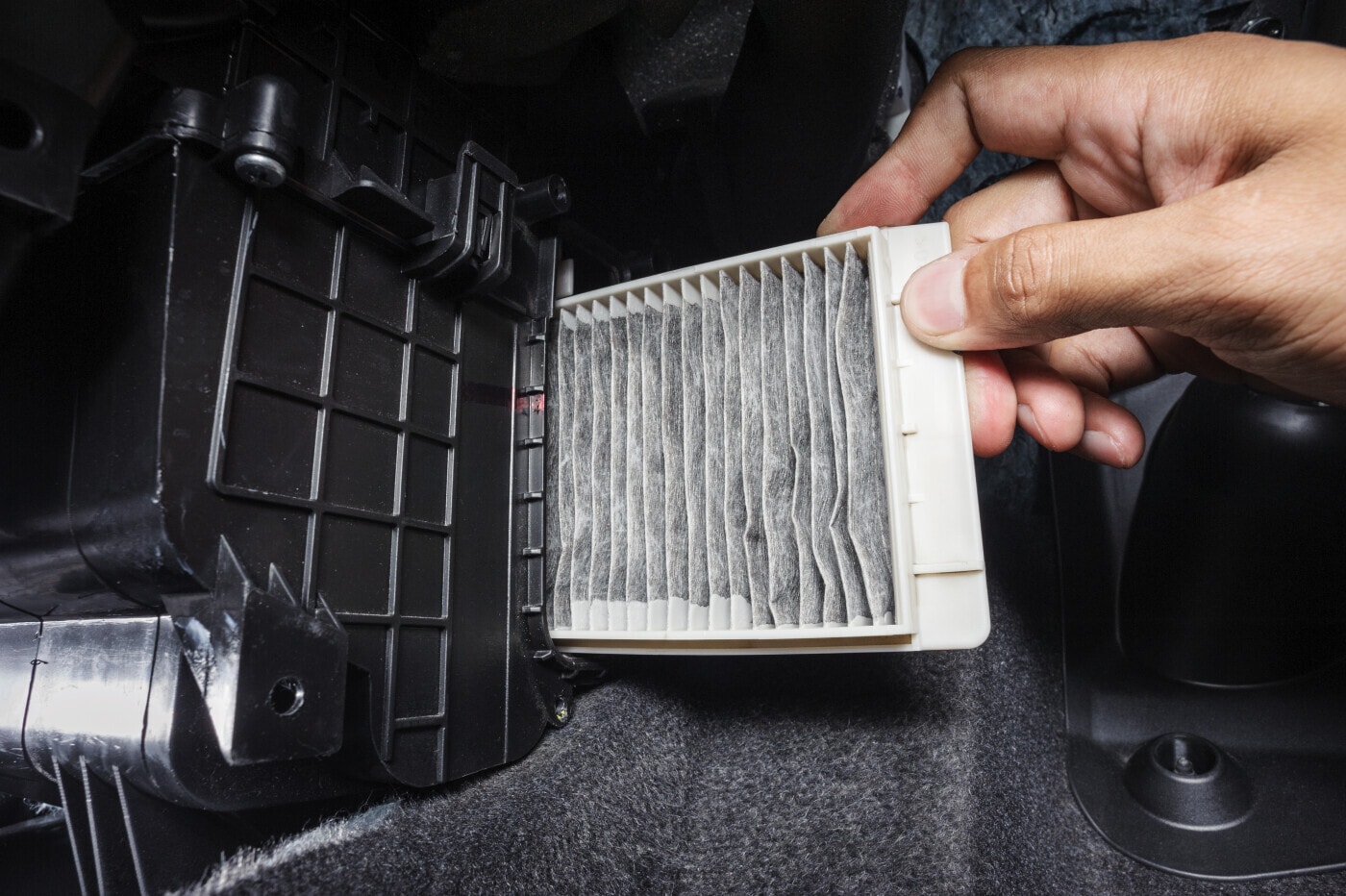 The air filter being changed in a vehicle.