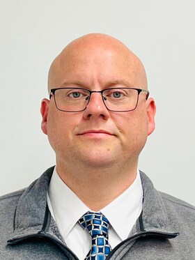 Staff member John Harkins from ID_2cc49f6e5c7b