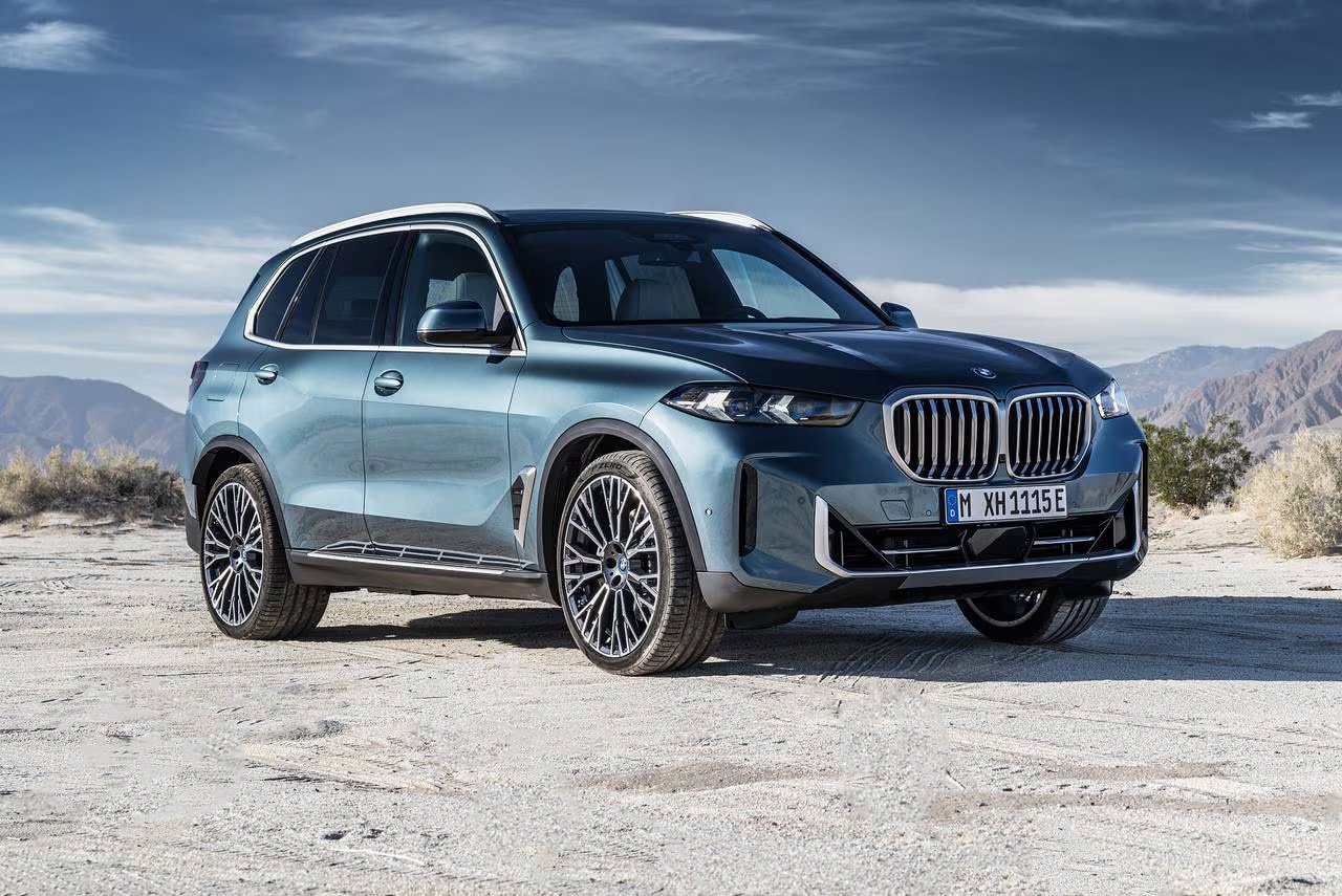 The 2026 BMW X5 Parked on a hill up in the mountains