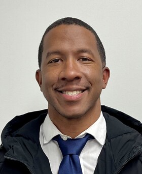 Staff member Angelo Young from ID_2cc49f6e5c7b