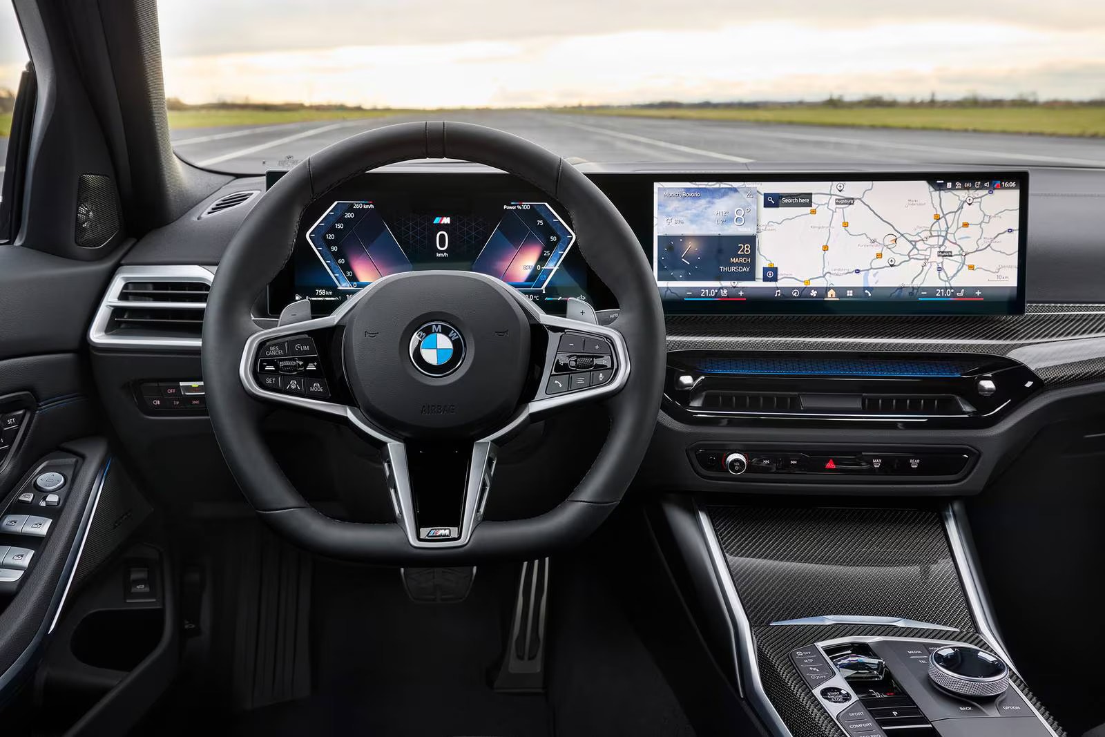 The front dash of a bmw 330i sedan.