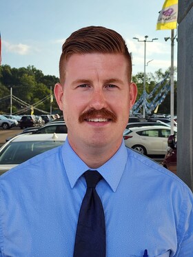 Staff member Logan Wallis from ID_69c82acbd39d
