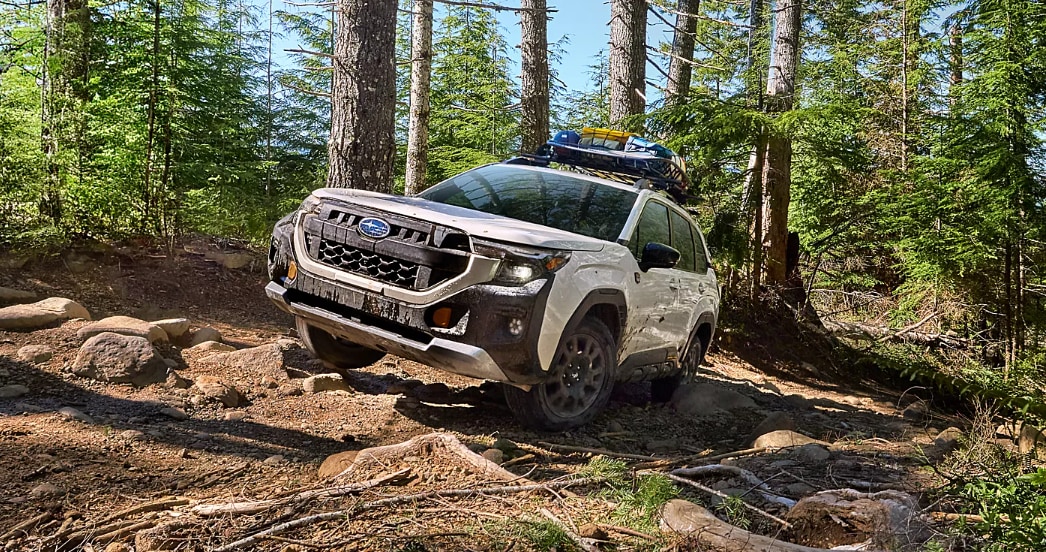 White%20Subaru%20driving%20off-road.png