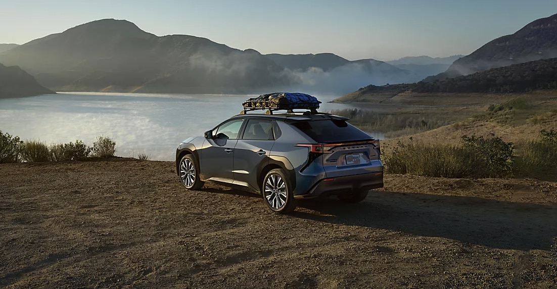 2026 Subaru Solterra parking outdoor showing side and rear view