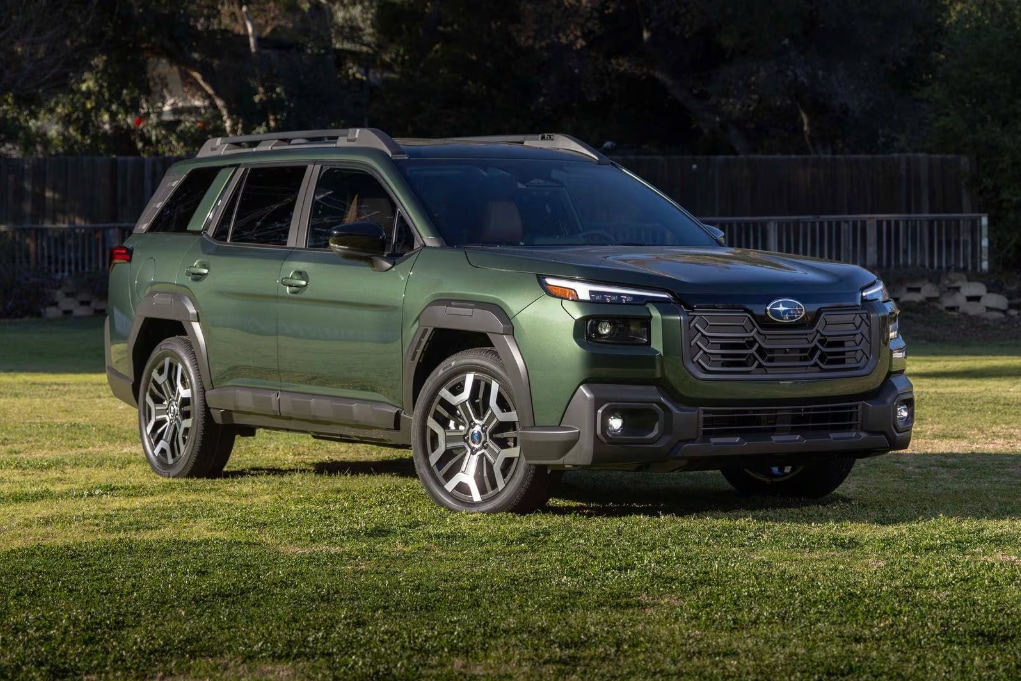 Green%20Subaru%20Outback%20on%20green%20grass.png