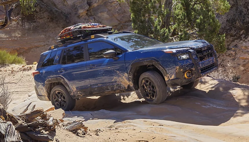 2026 Subaru Outback Wilderness driving on rocky off road trail