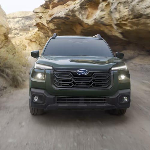 2026 Subaru Outback Touring shown in Deep Emerald Green Pearl front view