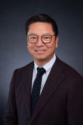 Staff member Joey Huang from ID_5248ff