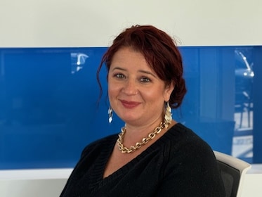 Staff member Chrissie Cortright from ID_abd99db9c34f