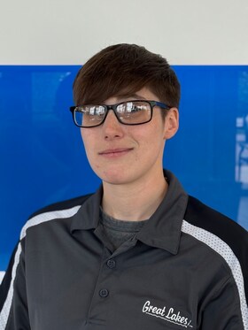 Staff member Melanie Reese from ID_5dc871c8cdf7