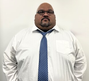 Staff member Greg Simpson from ID_87212b07226c