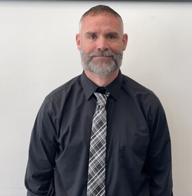 Staff member Buddy Travis from ID_843c309121a5