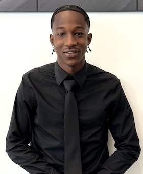 Staff member Djibril Diakite from ID_a7693e8c72d6