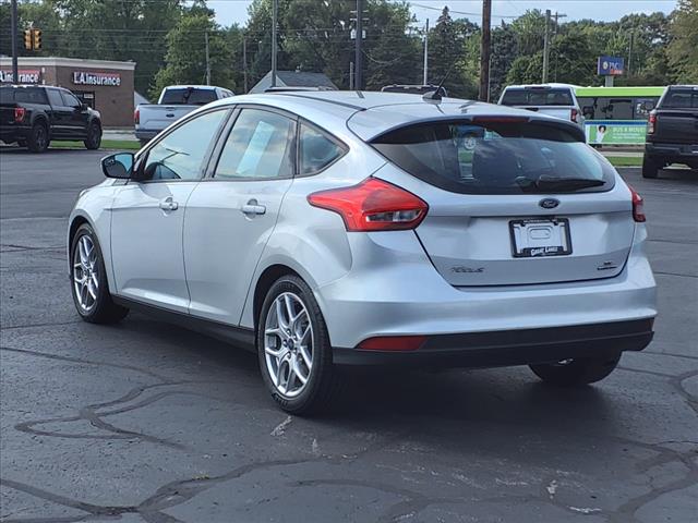 Used 2015 Ford Focus SE with VIN 1FADP3K23FL318429 for sale in Muskegon, MI