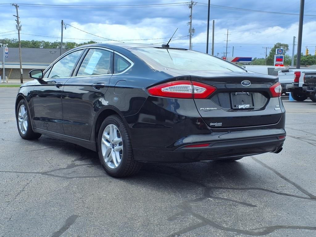 Used 2014 Ford Fusion SE with VIN 3FA6P0HDXER389126 for sale in Muskegon, MI