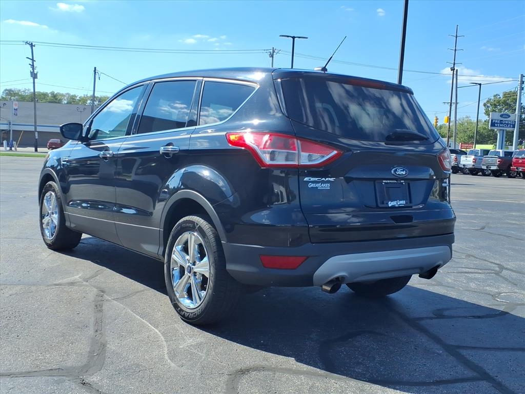 Used 2015 Ford Escape SE with VIN 1FMCU9GX2FUA05318 for sale in Muskegon, MI