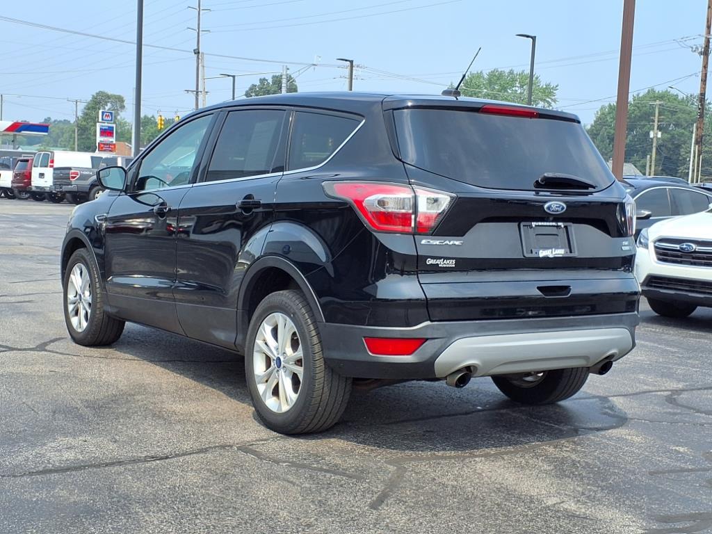 Used 2017 Ford Escape SE with VIN 1FMCU9G98HUB07405 for sale in Muskegon, MI