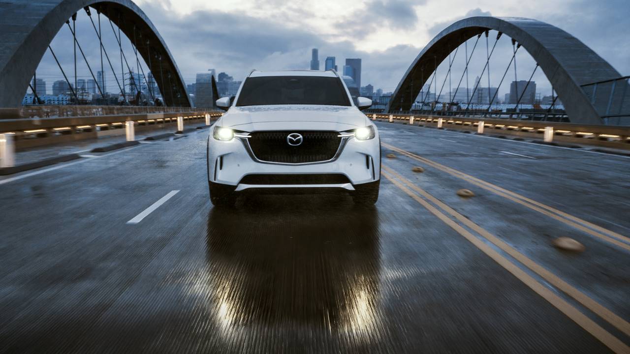 2024 MAZDA CX-90 PHEV Crossing Bridge.jpg