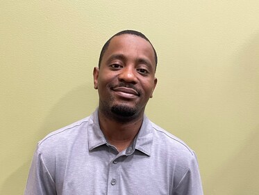 Staff member Marquis Robinson from 11751e3745be