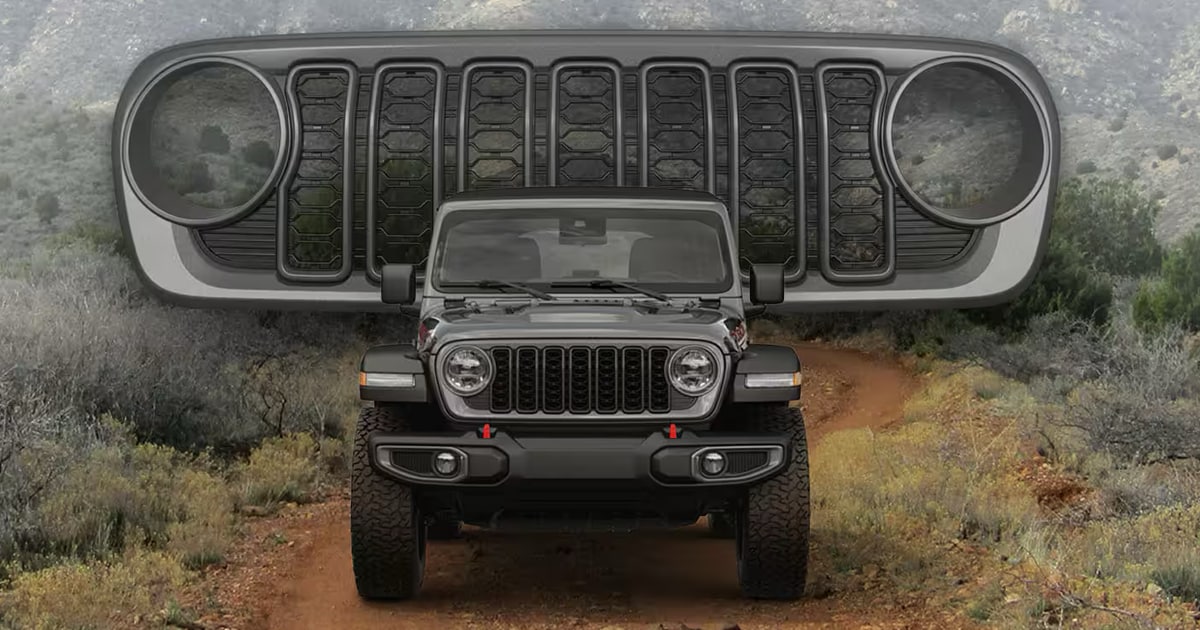 Front-view of a Jeep Gladiator driving off-orad with a front grille accessory