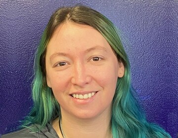 Staff member Lydia Tate from ID_f5e62e251e72