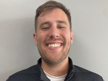 Staff member Luke Sinclair from ID_41a9e868ae3d